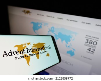 STUTTGART, GERMANY - Jan 23, 2022: Smartphone with logo of US investment firm Advent International Corporation on screen in front of website  Focus on center-left of phone display 