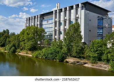 Stuttgart, Germany - July 31, 2022: Mercedes Benz Building In Bad Cannstatt. Landscape By The River On Sunny Summer Day Against Blue Cloudy Sky. Germany, Stuttgart.