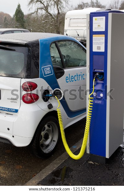 STUTTGART, GERMANY - NOV 30: A Car2go electric\
car at one of the 500 charging points on November 30, 2012 in\
Stuttgart, Germany. Car2go has over 300 electric Smart cars in the\
city of Stuttgart.