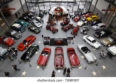 STUTTGART - MARCH 13: People buy cars - exhibition hall Retro Classics March 13, 2011 in Stuttgart, Germany.
