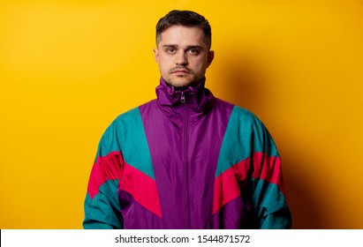 Style Man In 90s Tracksuit On Yellow Background