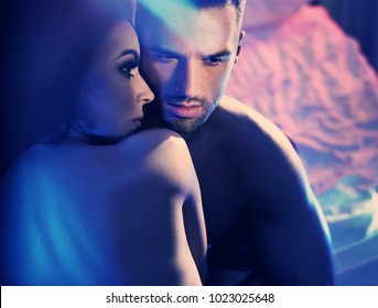 Styled Art Portrait Of  Sexy Passionate Couple Hugging On Bed 