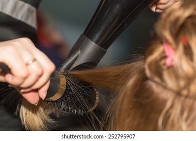 styling hair dryer in a beauty salon