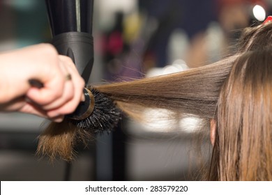 styling hair dryer in a beauty salon