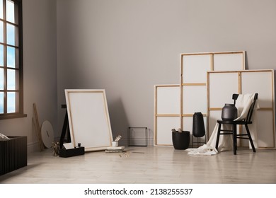 Stylish Artist's Studio Interior With Canvas And Brushes