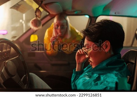 Similar – Tired women friends sleeping in a rear seat car