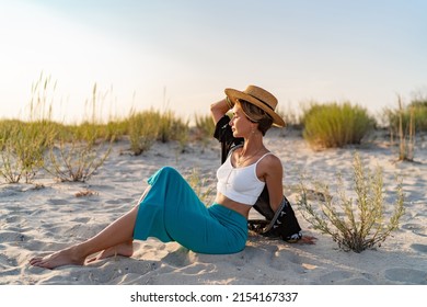 Stylish Attractive Slim Smiling Woman On Beach In Summer Style Fashion Trend Outfit Happy Having Fun Wearing Blue Skirt And Tunic Boho Style Chic And Straw Hat