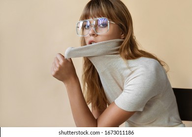 Stylish Beautiful Fashion Girl Wear Trendy Sunglasses Looking At Camera, Retro Vogue Sexy Attractive Young Model Woman Blond Hair In Eyewear Posing On Beige Studio Background, Portrait