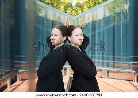 Similar – Image, Stock Photo Twin sisters stand laughing back to back in front of a stone wall