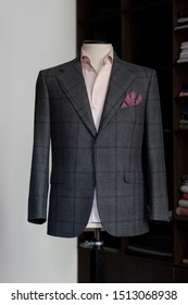Stylish bespoke checkered jacket. Men's jacket on a mannequin. Men's Clothing
