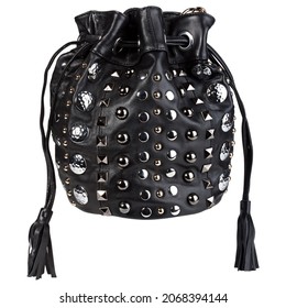 Stylish Black Handbag Or Purse For Ladies. Soft Leather Shoulder Bag With Long Adjustable Strap, With Buckle, Silver And Gold Studs, Drawstring Closure, And Tassel. Closeup View.