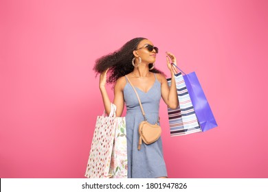 Stylish Black Lady Carrying Shopping Bags