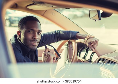 Stylish Black Man In A Car.