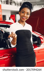 Stylish Black Woman In A Car Salon