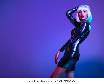 Stylish blonde in shiny dress. Full-length portrait of beautiful  fashionable woman in shining dress, space concept. Art portrait  of  an young attractive model. Fantasy style. Glamour fashion girl   - Shutterstock ID 1913236675