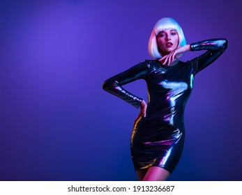 Stylish blonde in shiny dress. Full-length portrait of beautiful  fashionable woman in shining dress, space concept. Art portrait  of  an young attractive model. Fantasy style. Glamour fashion girl   - Shutterstock ID 1913236687