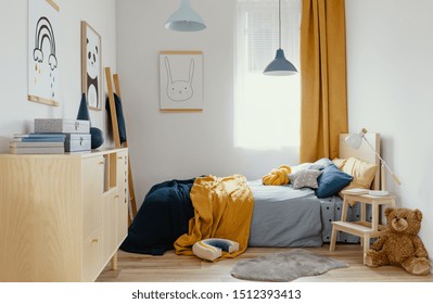 Stylish Blue And Orange Kid's Bedroom Design In Bright Apartment