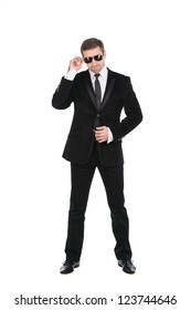 Stylish Bodyguard With Glasses And Folded Arms. Isolated Over White Background