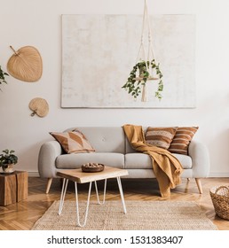 The Stylish Boho Compostion At Living Room Interior With Design Gray Sofa, Wooden Coffee Table, Commode And Elegant Personal Accessories. Honey Yellow Pillow And Plaid. Cozy Apartment. Home Decor