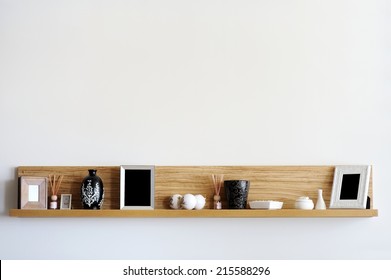 Stylish Bookshelf On A White Wall