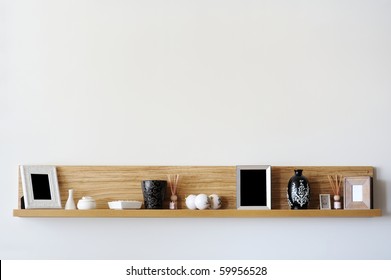 Stylish Bookshelf On A White Wall