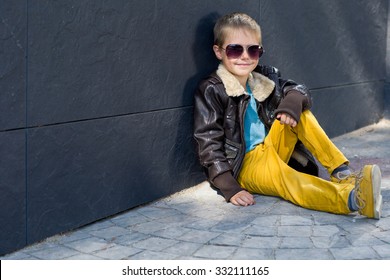 stylish boy in leather jacket 