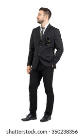 Stylish Business Man Looking Away With Hand In Pocket. Full Body Length Portrait Isolated Over White Studio Background.