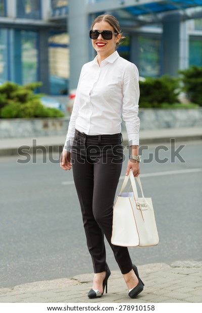 Stylish business woman in\
the big city
