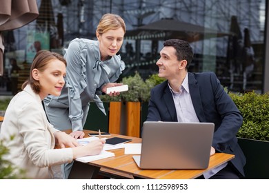 Stylish businesswoman. Successful blonde-haired businesswoman wearing stylish elegant blouse feeling engaged in joining staff meeting