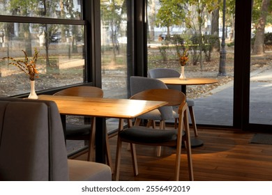Stylish cafe with large windows. Interior design