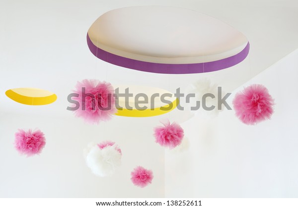 Stylish Ceiling Dangling Pink White Pompoms Stock Photo