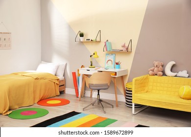 Stylish Child Room Interior With Comfortable Bed And Desk