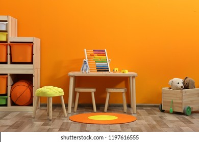 Stylish Children's Room Interior With Toys And New Furniture