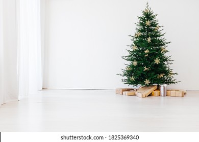 Stylish Christmas Scandinavian Minimalistic Interior Christmas Tree With Light And Bauble In Sunny Living Room