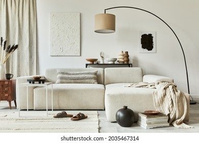 Stylish composition of cozy living room interior design with mock up poster frame and structure painting, corner sofa, coffee table, textile and personal accessories. Scandinavian classic style.