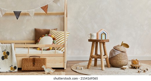 Stylish Composition Of Cozy Scandinavian Child's Room Interior With Wooden Bed, Toys And Hanging Decorations. Creative Wall. Copy Space. Template. 