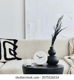 Stylish Composition At Fancy Interior With Wooden Black Coffee Table, Dried Flowers In Vase, Pillow, Blanket In Modern Home Decor. Details. Template.