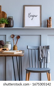 Stylish Composition Of Kitchen Interior With Wooden Family Table, Vegetables, Herbs, Food Supplies, Mock Up Photo Frame And Kitchen Accessories In Gray Concept Of Home Decor. 