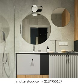 Stylish Composition Of Modern Bathroom Interior. Designed Shower, Mixed Wood Commode, Mirror And Personal Accessories. Walls With Black And Wooden Panels. Minimalistic Masculine Concept. Template.