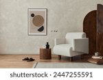 Stylish composition of modern cozy living room interior with structure painting on the wall, beige armchair, folding screen and personal accessories. Creative wall, carpet on the floor. Template.