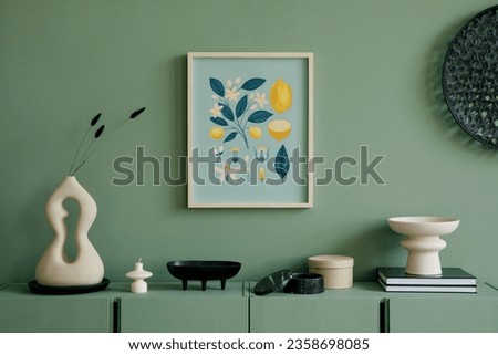 Stylish composition of modern living room interior. Mock up poster frame, wooden green commode and elegant personal accessories. Eucalyptus wall. Home staging. Template. Copy space.