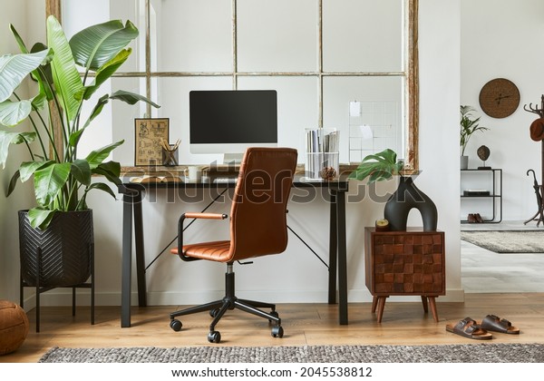 Stylish\
composition of modern masculine home office workspace interior\
design with black industrial desk, brown leather armchair, pc and\
stylish personal accessories.\
Template.