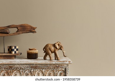 Stylish composition at moroccan interior with wooden shlef, cube, design elephant figure and decoration in modern home decor. Details. Template. Copy space. - Shutterstock ID 1958358739