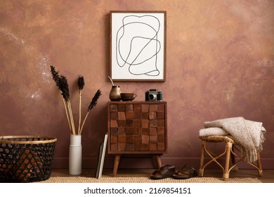 The stylish compostion at living room interior with mock up, design wooden sideboard and elegant personal accessories. Brown wall Cozy apartment. Home decor. Template. 