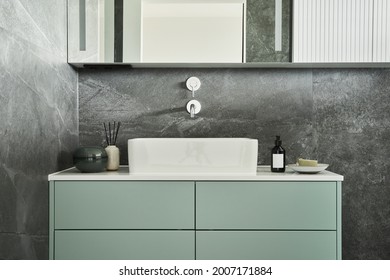 Stylish And Creative Minimalistic Small Bathroom Interior Design With Marble Walls With Green Panels, Plants And Beautiful Bathroom Accessories. Minimalistic Home Concept.
