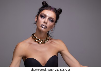 Stylish Creative Youth Halloween Costume. Modern Face Art. Masquerade Disco. Purple Violet Background Copy Space. Woman With Glamorous Makeup Portrait. Massive Accessory Chain. Strange Emotions