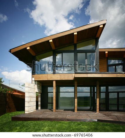 Stylish design house with the big glass windows