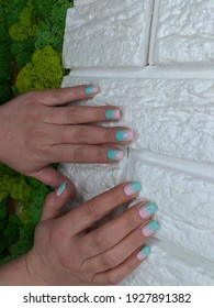stylish design nail manicure in gentle spring   summer shades  Pink and blue color smooth transition ombre gradient nails 