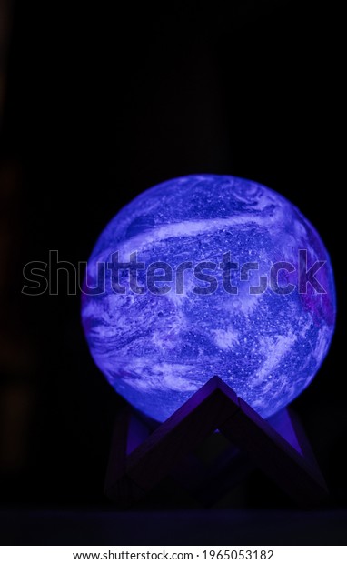 stylish designer moon\
lamp with neon glow