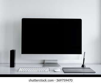 Stylish or designer workspace with computer on home or studio